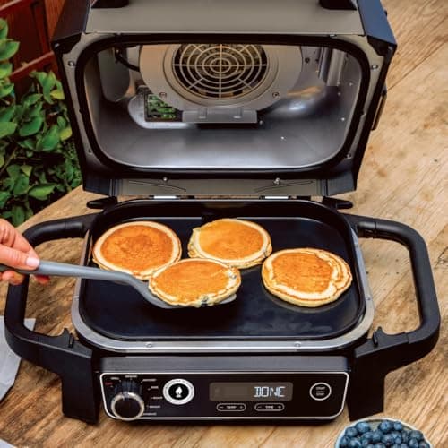 Ninja OG705CO 7-in-1 Outdoor Electric Grill & Smoker - Grill, BBQ, Air Fry, Roast & Dehydrate - Uses Woodfire Pellets - Portable & Weather Resistant, Black