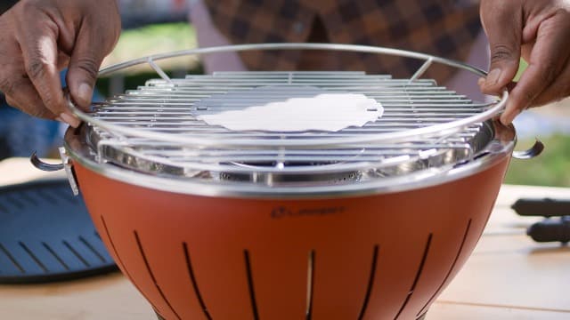 Lippert Odyssey Portable Grill - Compact and Versatile Charcoal Grill for Camping, Tailgating, and Outdoor Cooking - Lightweight and Durable Design with Large Cooking Surface - Amber
