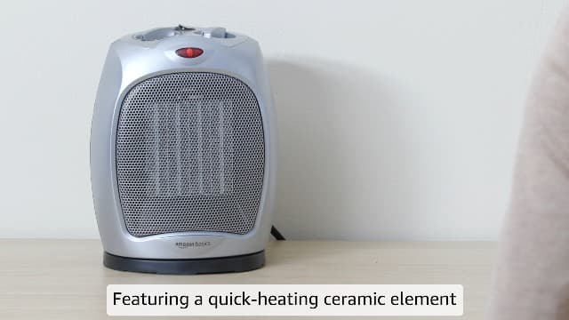 Amazon Basics Oscillating Ceramic Space Heater, Portable Heater for Indoor Use, for Office and Home, With Overheat and Tip-Over Protection, Thermostat, 1500W, Silver, 7.52"D x 6.34"W x 9.45"H