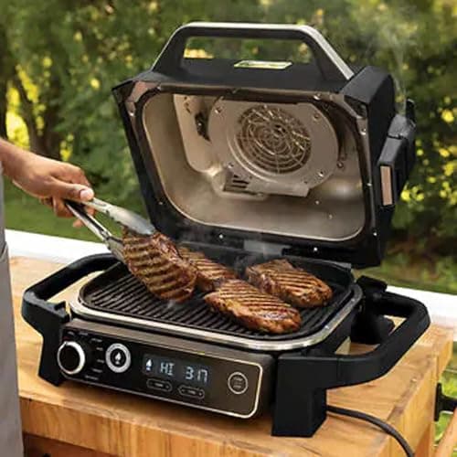 Ninja OG705CO 7-in-1 Outdoor Electric Grill & Smoker - Grill, BBQ, Air Fry, Roast & Dehydrate - Uses Woodfire Pellets - Portable & Weather Resistant, Black