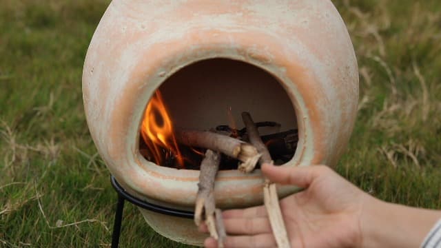 Beige Outdoor Clay chiminea Outdoor Fireplace Sun Design Charcoal Burning Fire Pit with Sturdy Metal Stand, Barbecue, Cocktail Party, Family Gathering, Cozy Nights Fire Pit