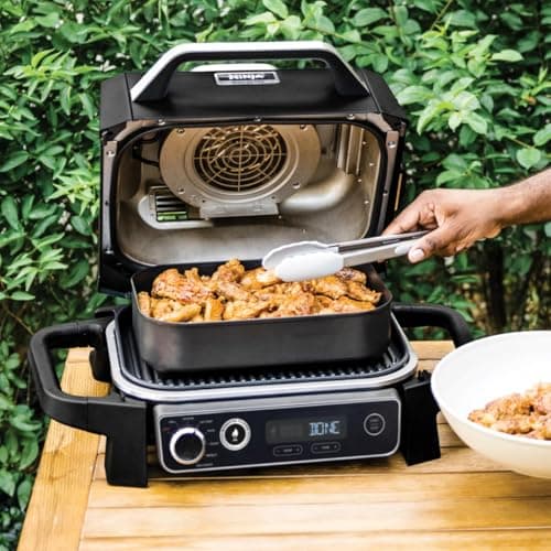Ninja OG705CO 7-in-1 Outdoor Electric Grill & Smoker - Grill, BBQ, Air Fry, Roast & Dehydrate - Uses Woodfire Pellets - Portable & Weather Resistant, Black