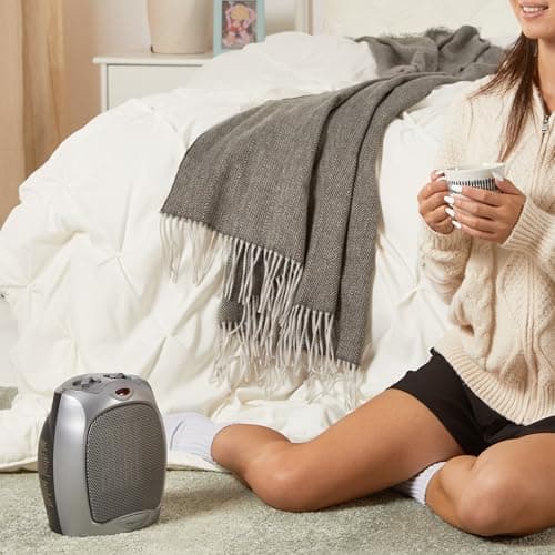 Amazon Basics Ceramic Space Heater, Portable Heater for Indoor Use, for Office and Home, With Overheat and Tip-Over Protection, Thermostat, Non-Oscillating, 1500W, Silver, 7.52"D x 6.34"W x 9.45"H
