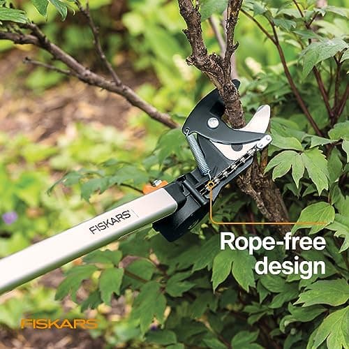 Fiskars 2-in-1 Extendable Tree Pruner and Pole Saw (Extends 7.9 - 12 feet) with Rotating Head, Pruning Stik Model with15-Inch Double-Grind Saw Blade, and Double Locking System