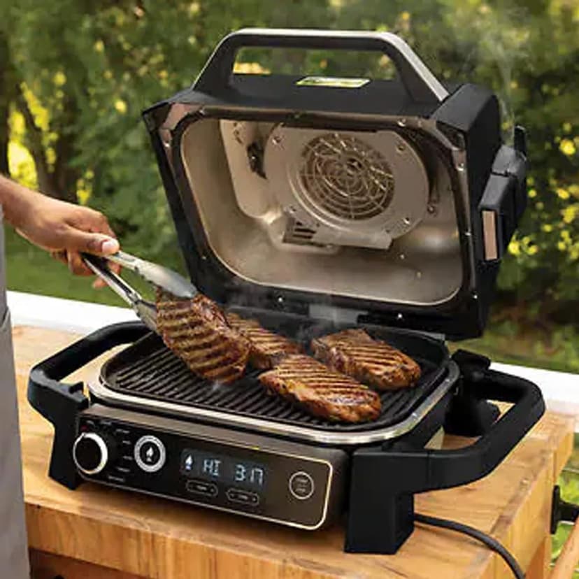 Ninja OG705CO 7-in-1 Outdoor Electric Grill & Smoker - Grill, BBQ, Air Fry, Roast & Dehydrate - Uses Woodfire Pellets - Portable & Weather Resistant, Black