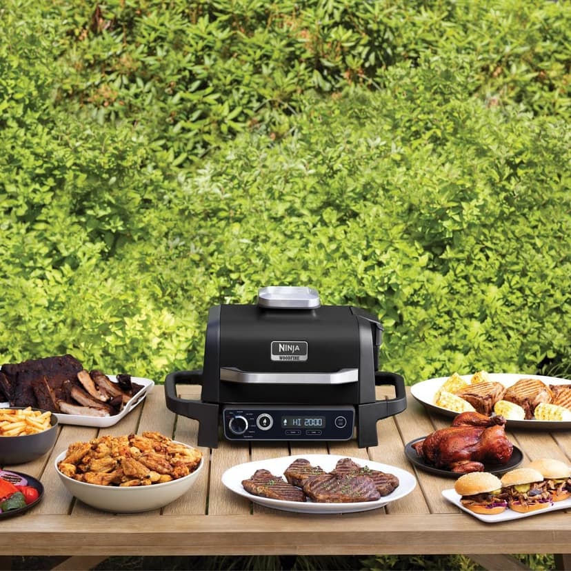 Ninja OG705CO 7-in-1 Outdoor Electric Grill & Smoker - Grill, BBQ, Air Fry, Roast & Dehydrate - Uses Woodfire Pellets - Portable & Weather Resistant, Black