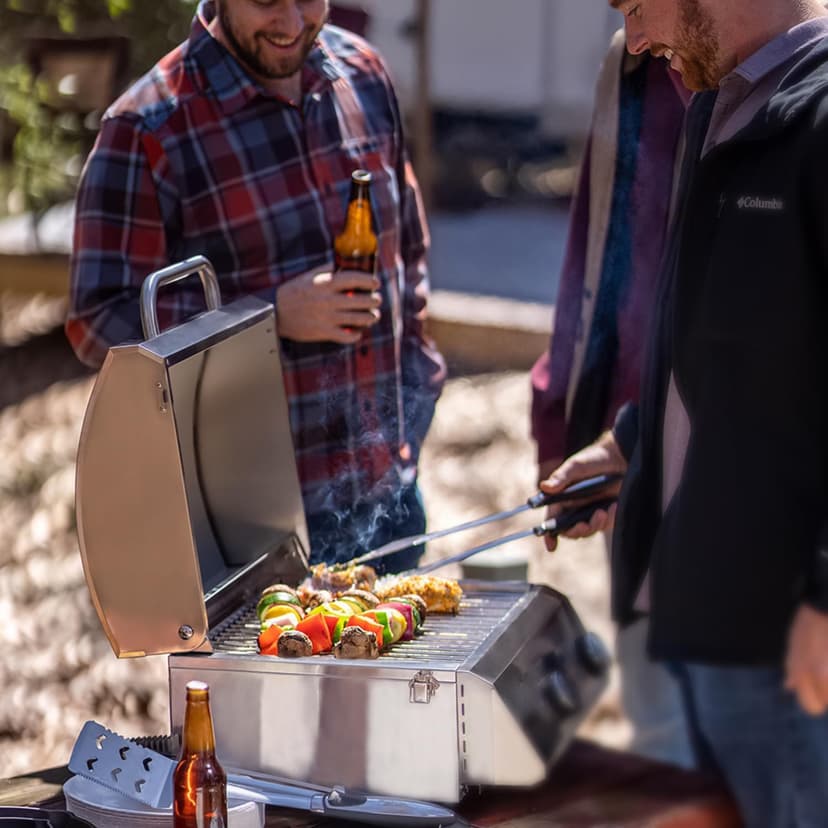 Monument Grills Tabletop Propane Gas Grill for Outdoor Portable Camping Cooking with Travel Locks, Stainless Steel High Lid, and Built in Thermometer