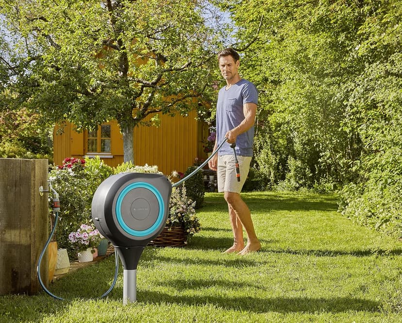 GARDENA (18614-80) 66' x 1/2" Automatic Retractable Garden Hose Reel on Metal Spike, 66' Outside Garden Hose Length, with 360° Rotation to Reach All Areas of Your Yard